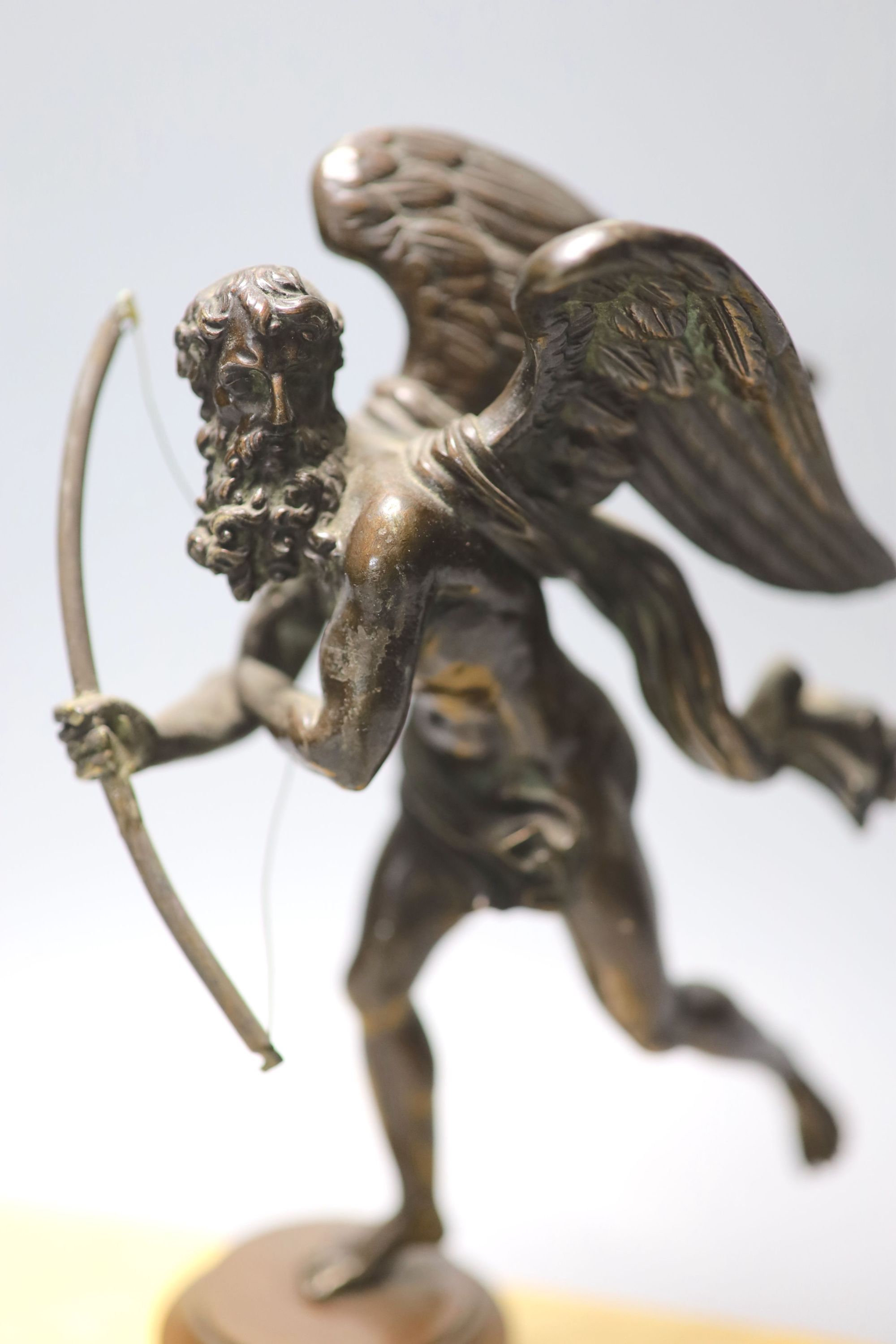 A neoclassical style bronze figure of Father Time, wood and marble plinth, 20cm high